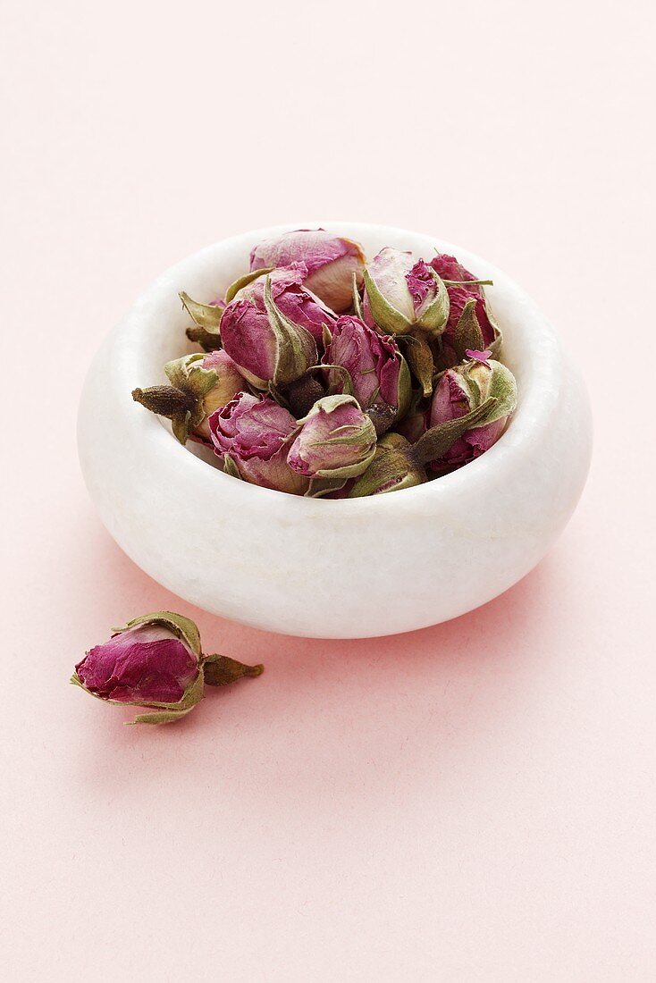 A bowl of rose buds