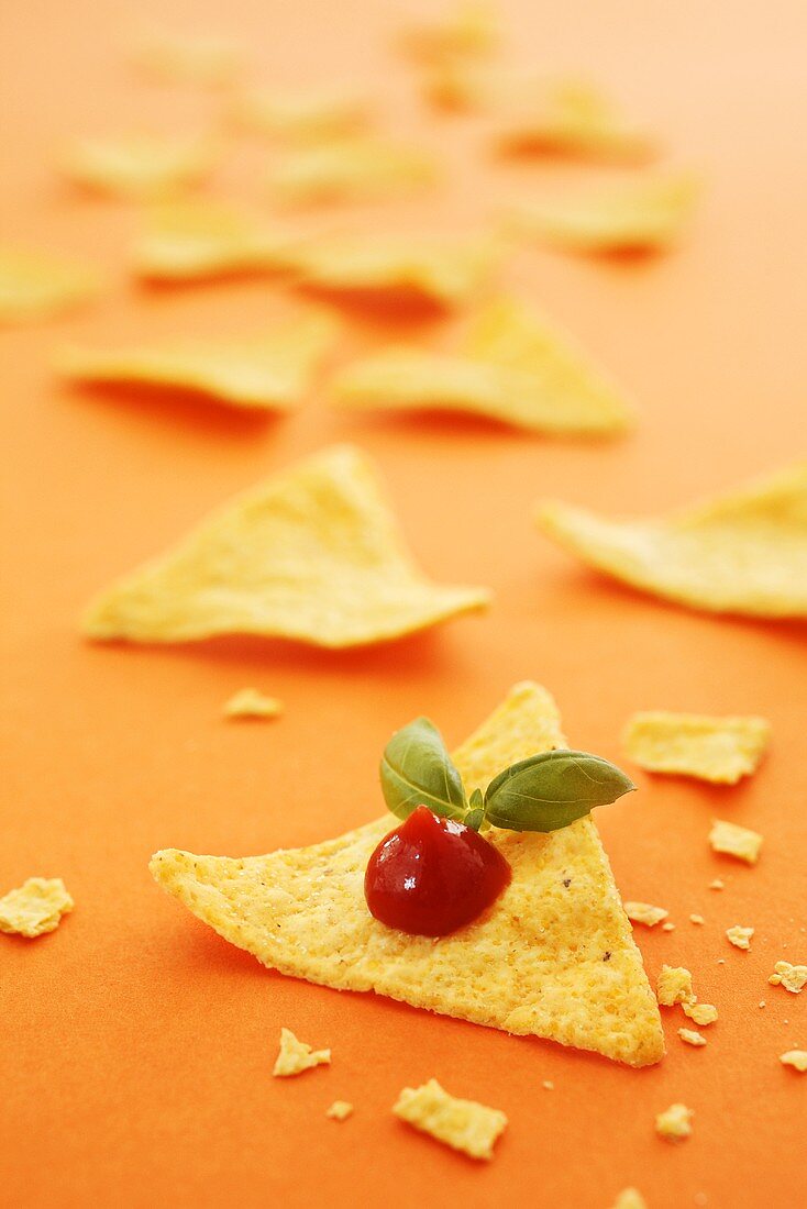 Tacos with ketchup and basil