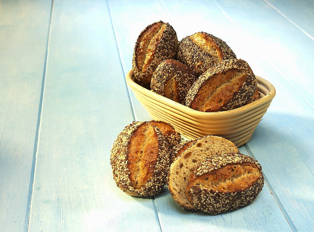 Spelt rolls in a bread basket and next to it