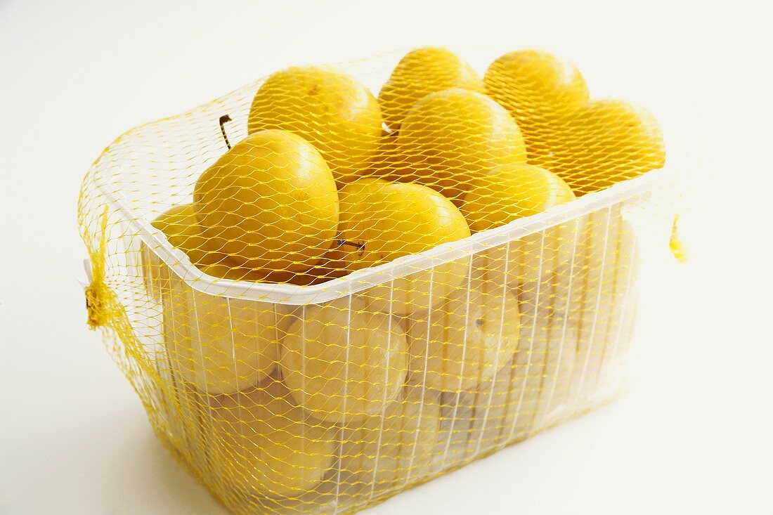 Yellow plums in packaging
