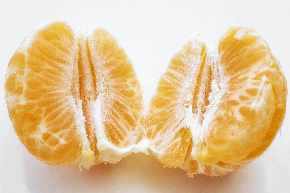 Peeled, halved clementine