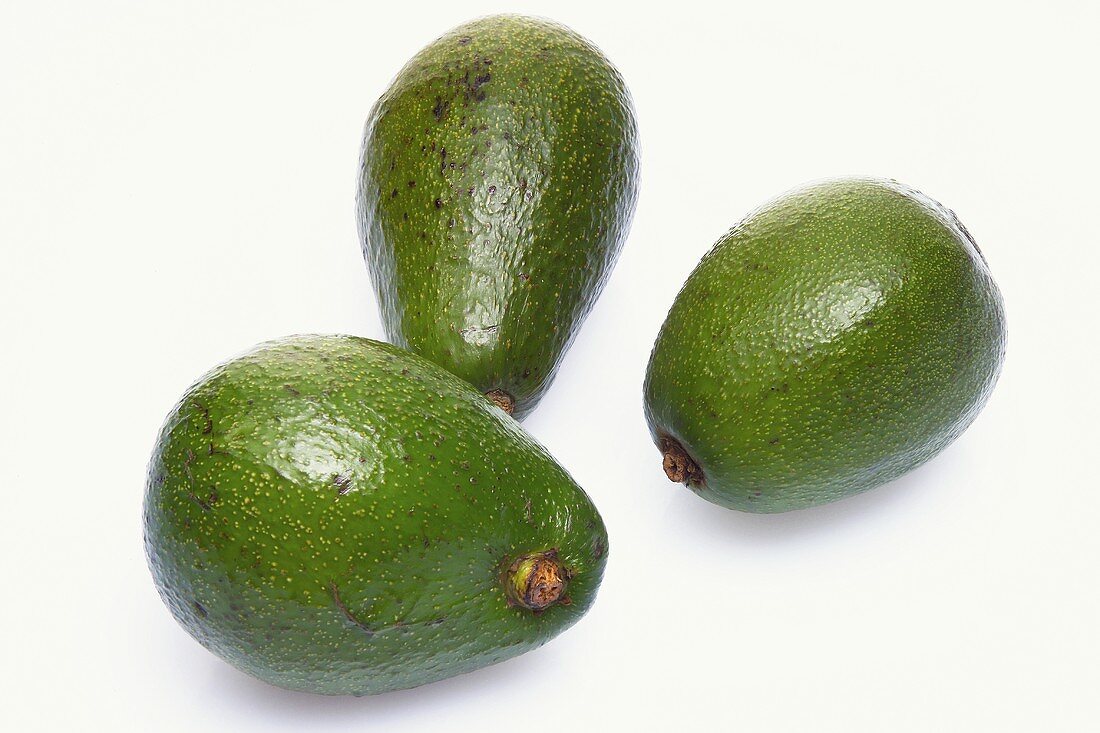 Three whole avocados