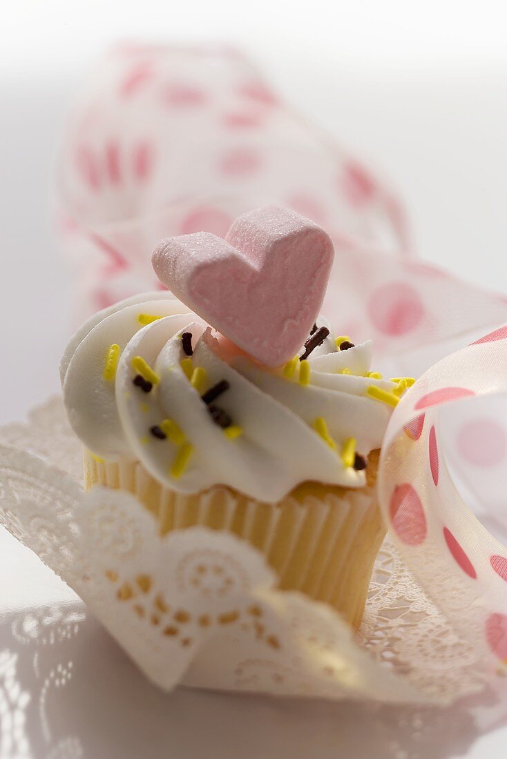 Muffin with heart decoration to give as a gift
