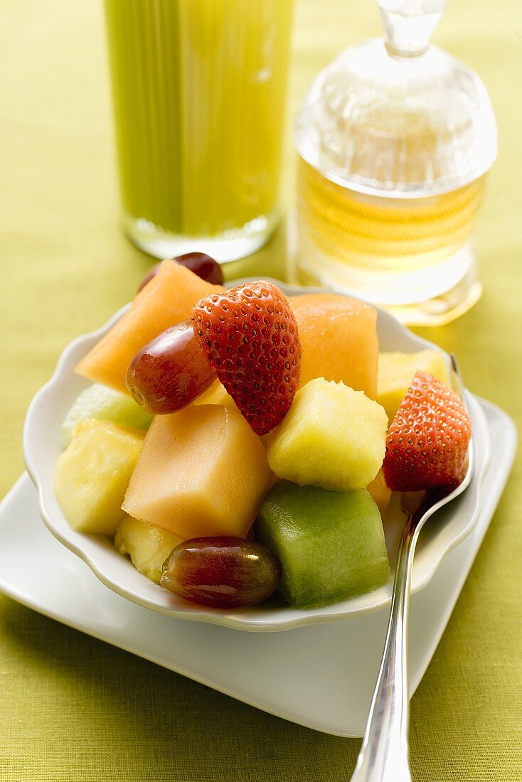 Colourful fruit salad with fruit and berries