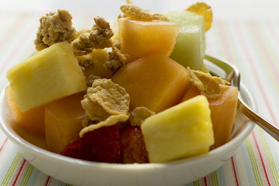 Pieces of fruit with cereal flakes
