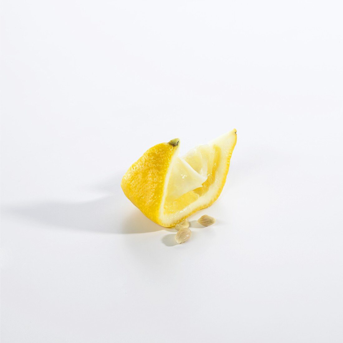 Squeezed lemon wedge