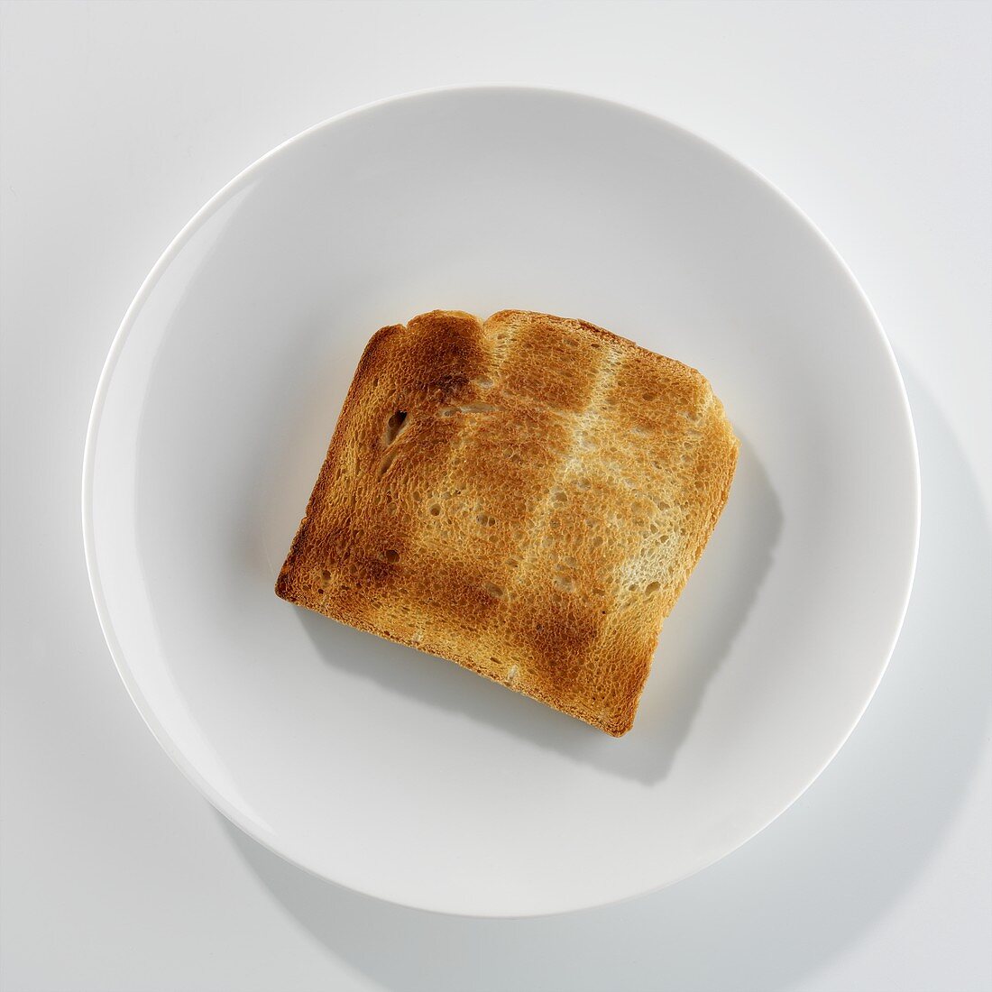 Eine Scheibe Toast auf einem Teller