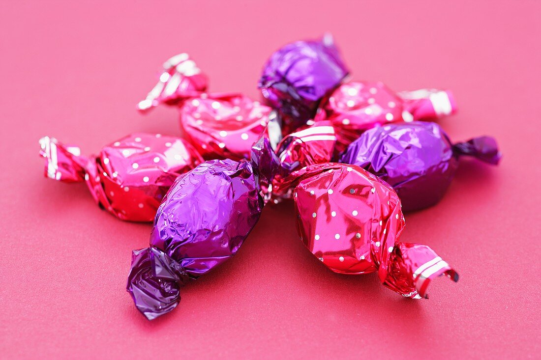 Sweets in pink and purple wrappers