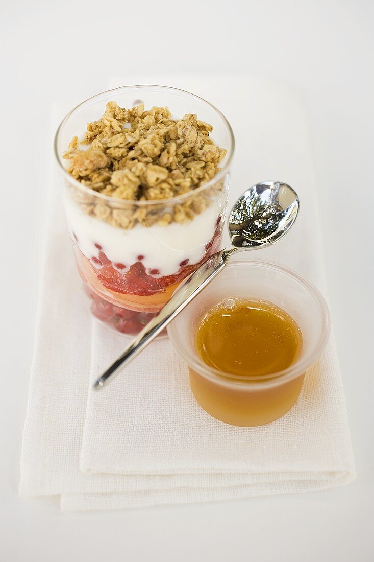 Layered dessert with fresh fruit, yoghurt and muesli