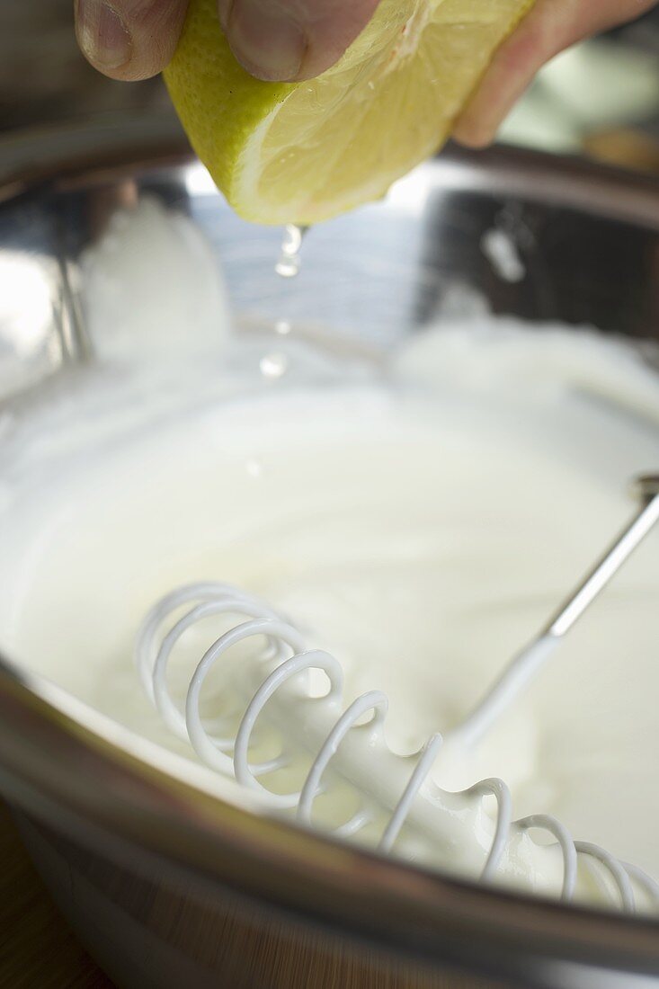 Squeezing lemon juice into quark cream