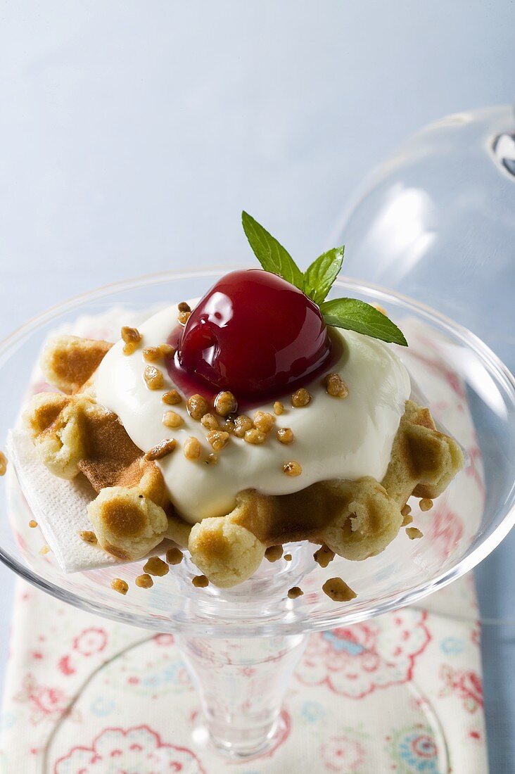 Waffle with vanilla cream and cherries