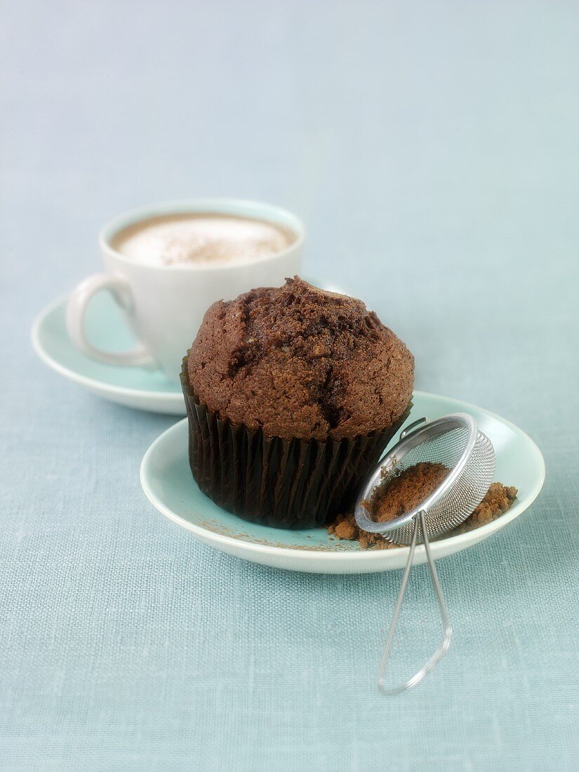 Chocolate muffin and cappuccino