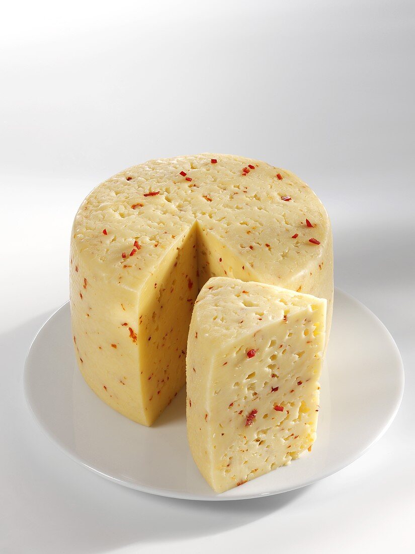 Tilsiter cheese with red pepper