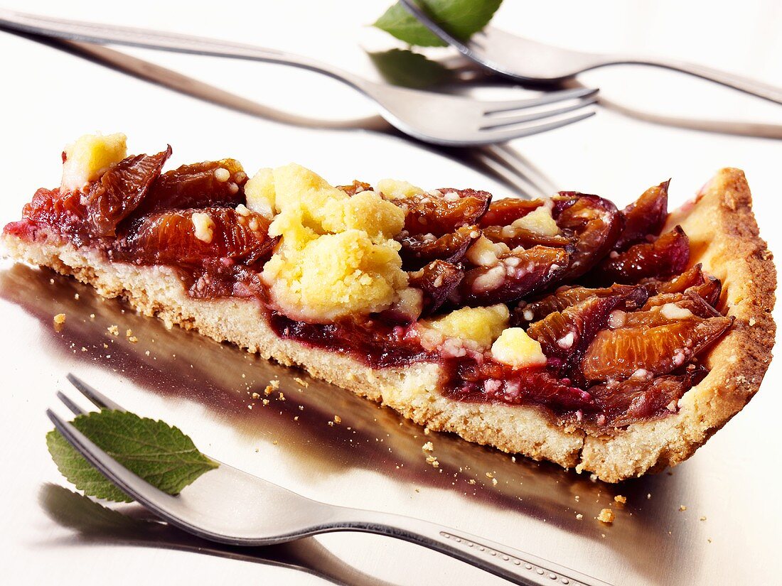 A piece of damson crumble tart