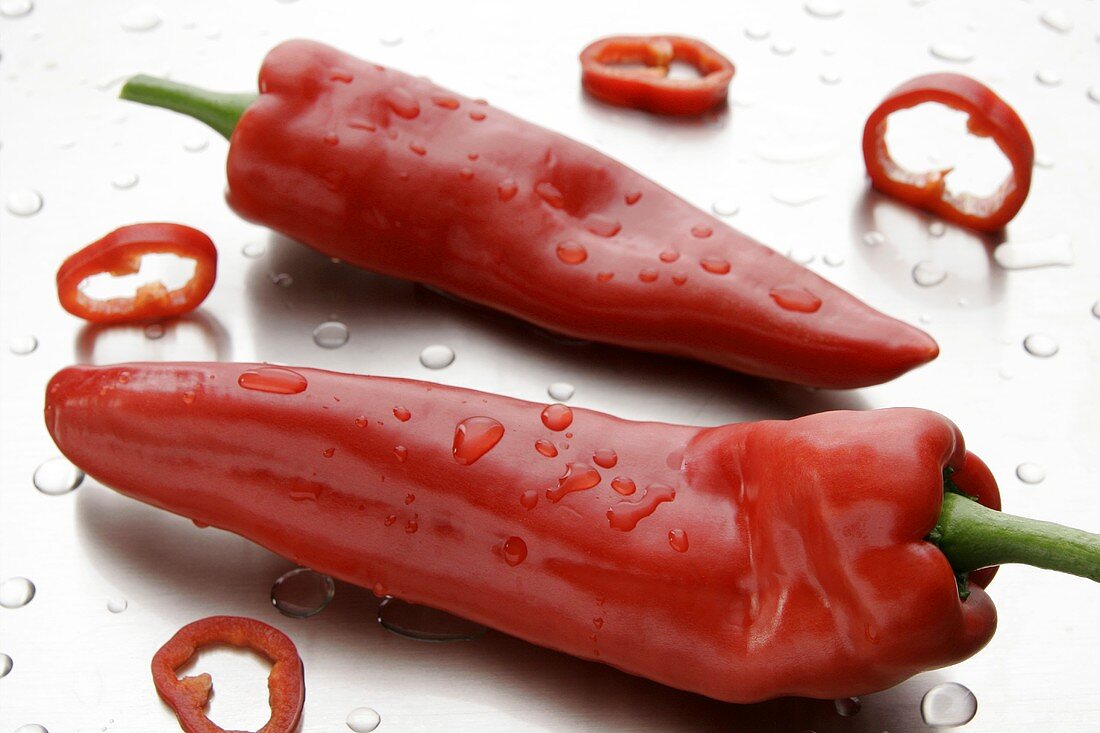 Two red pointed peppers