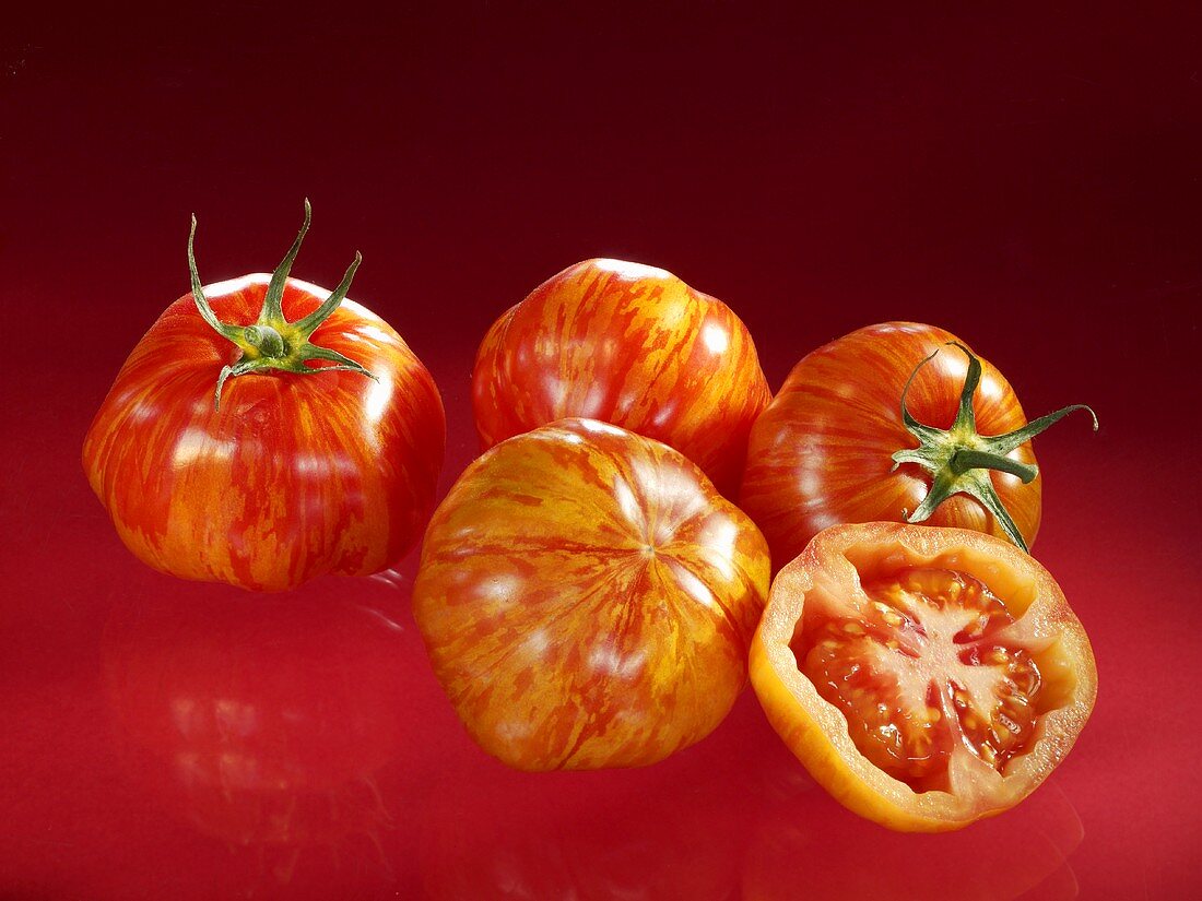 Tiger tomatoes, four whole and one half