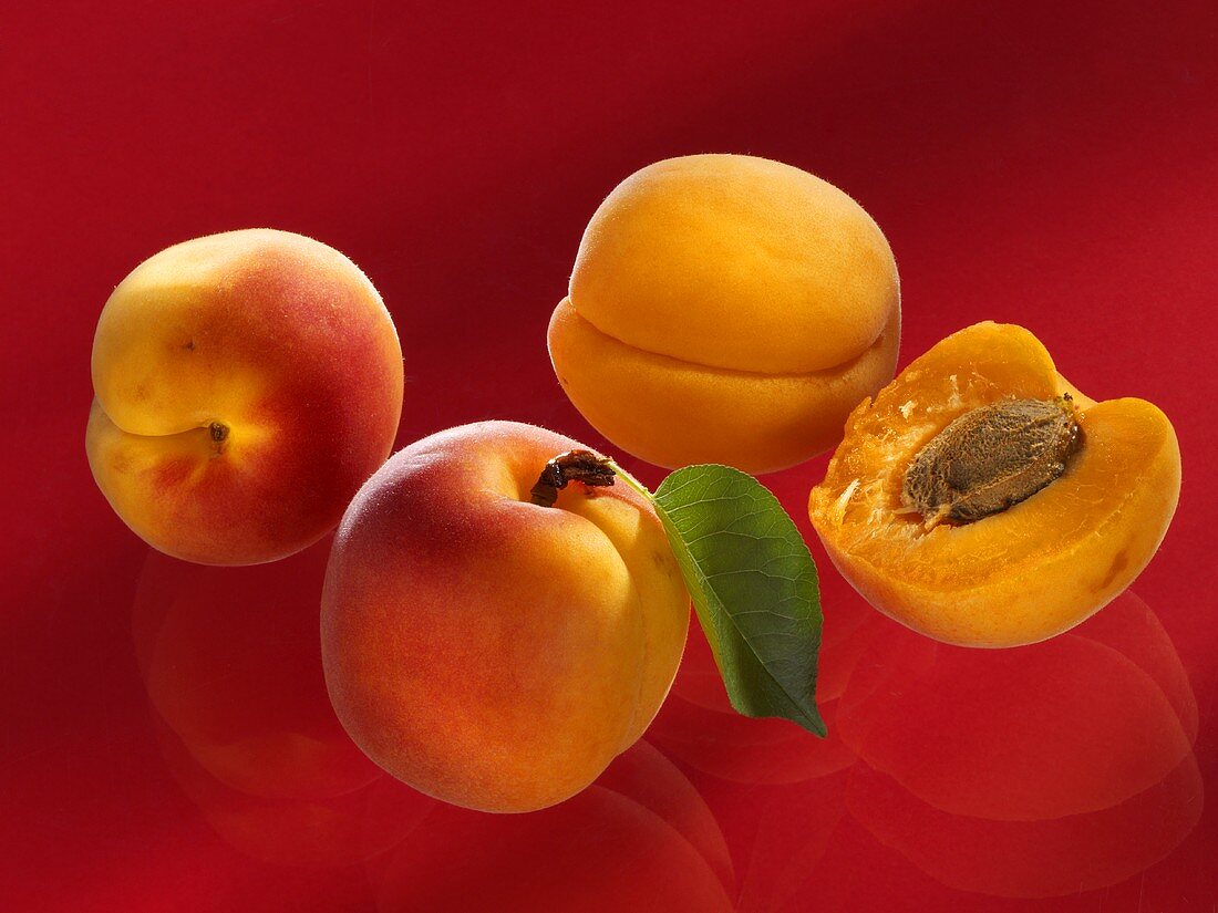 Three whole and one half apricot