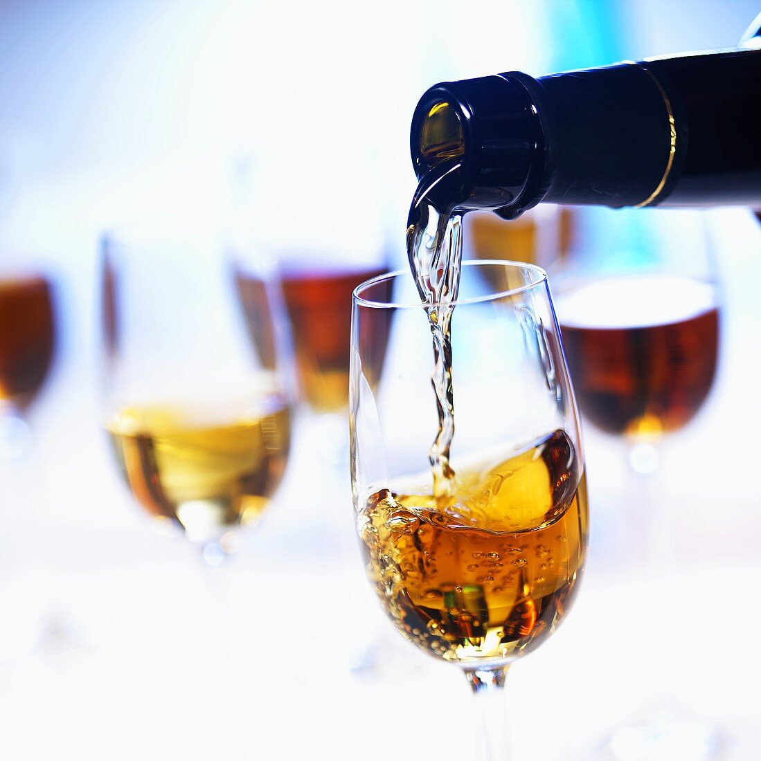 Pouring sherry into a glass