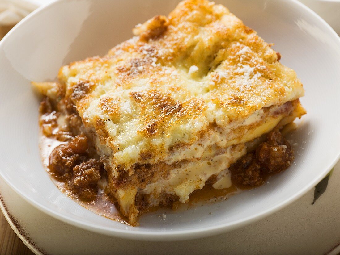 A portion of lasagne in a deep plate