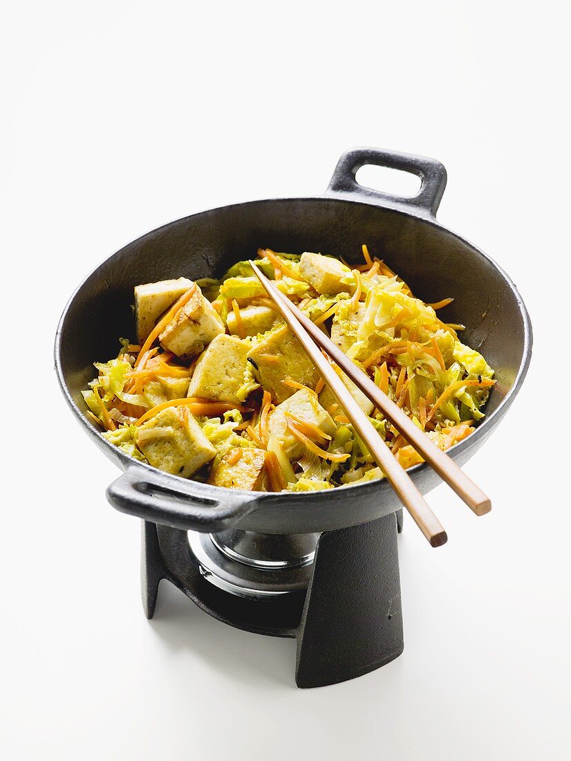 Stir-fried vegetables and tofu in wok