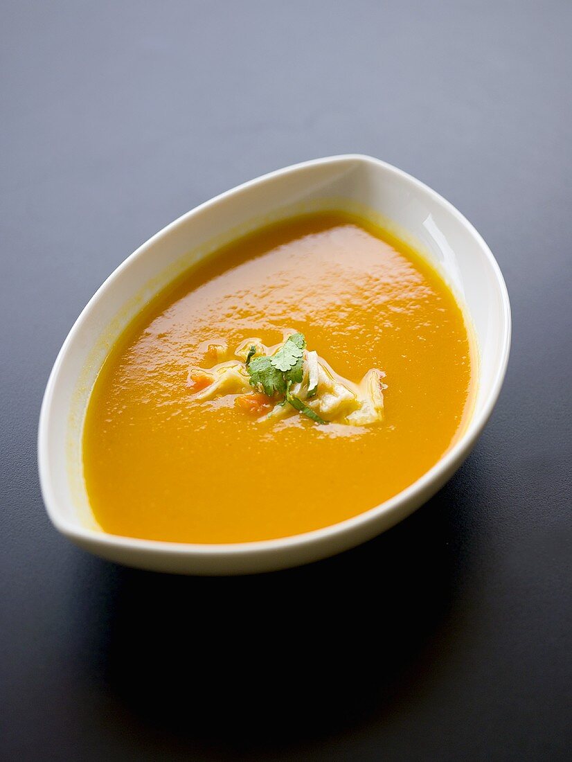 Carrot soup in a small bowl