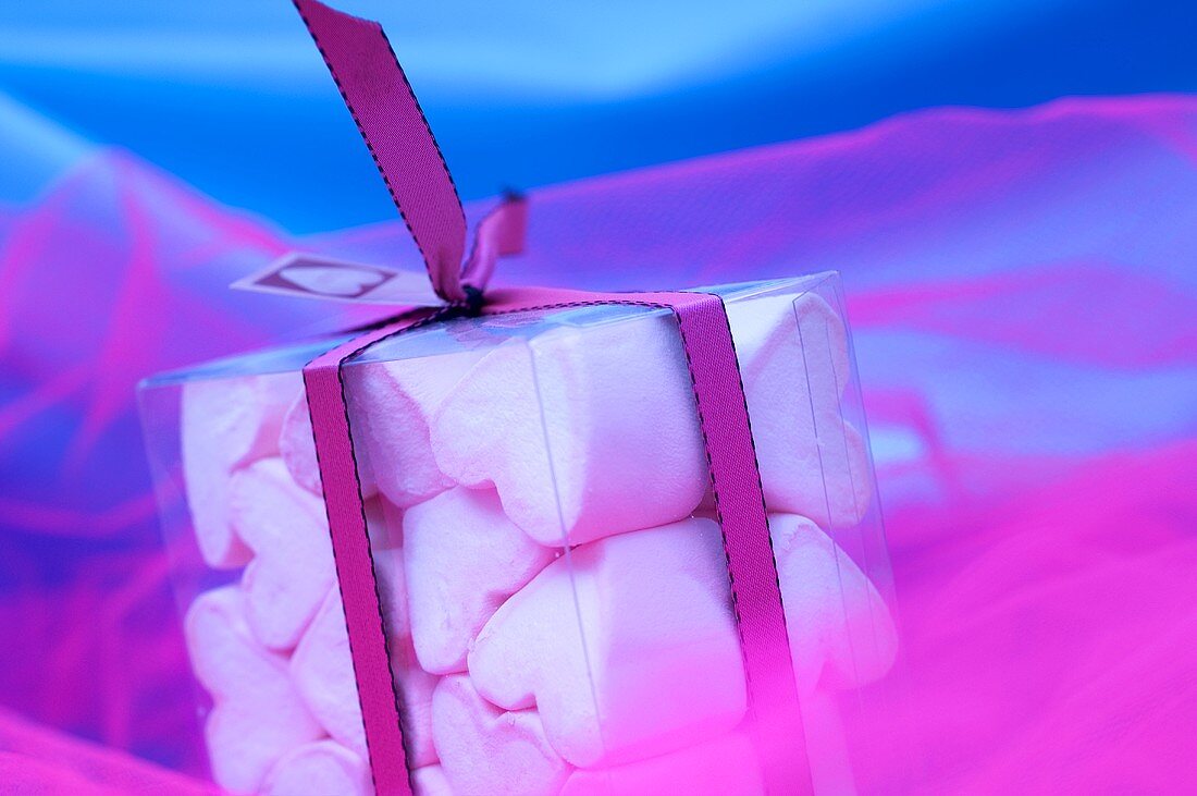 Pink and white marshmallow hearts in packaging