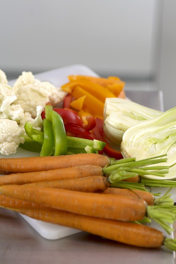 Sliced vegetables on a chopping board