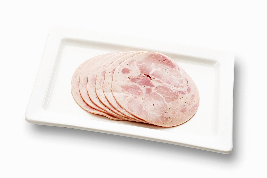 Sliced Bierschinken (ham sausage) on a plate