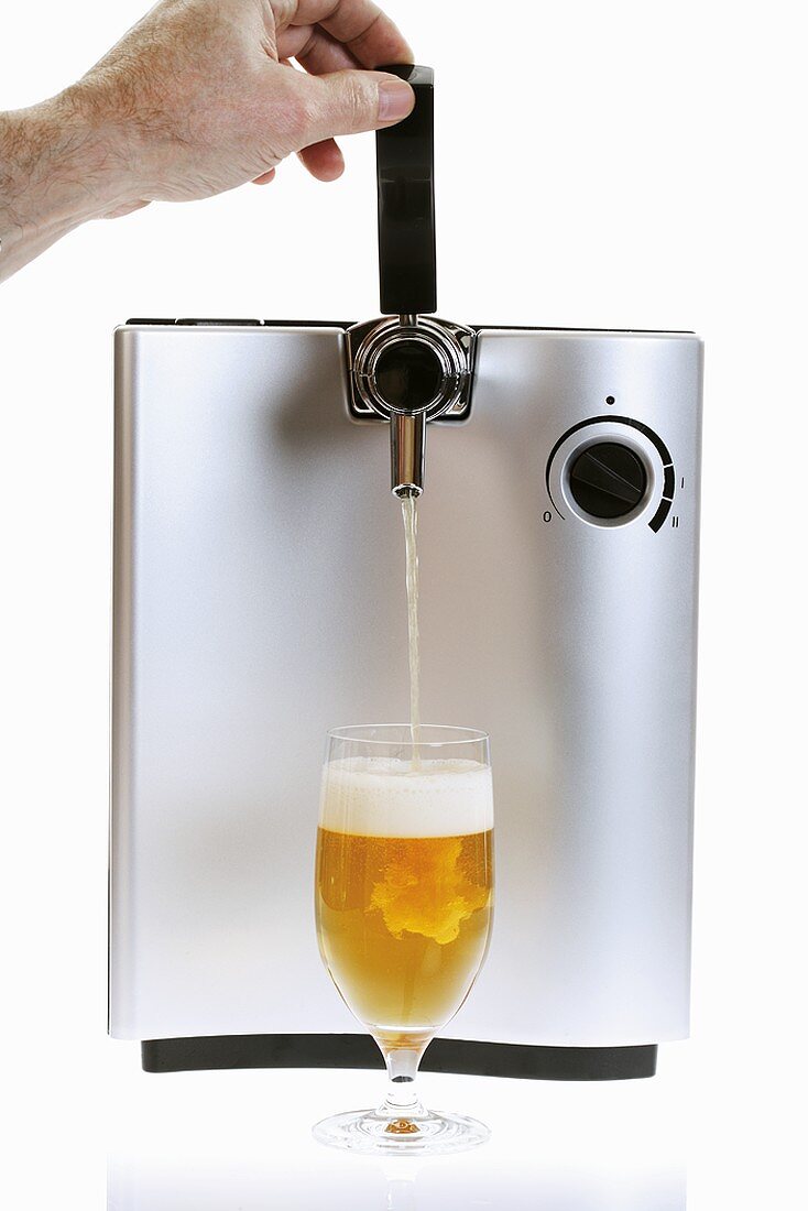 Pouring a glass of draught beer