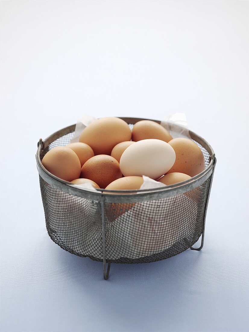 Brown eggs in a basket