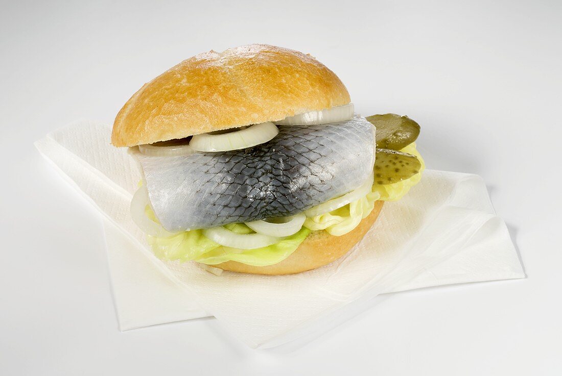 Herring roll with gherkin and onion