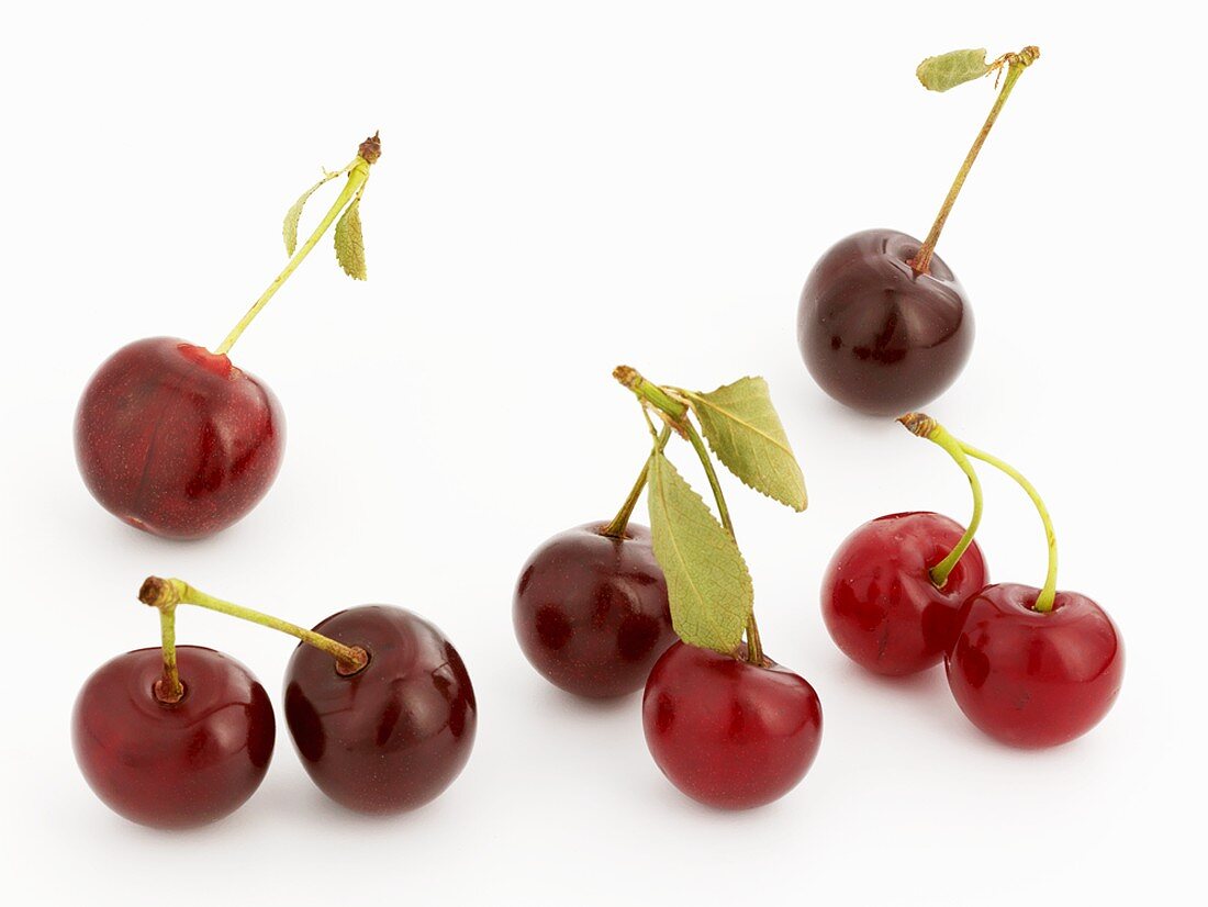 Several cherries and pairs of cherries