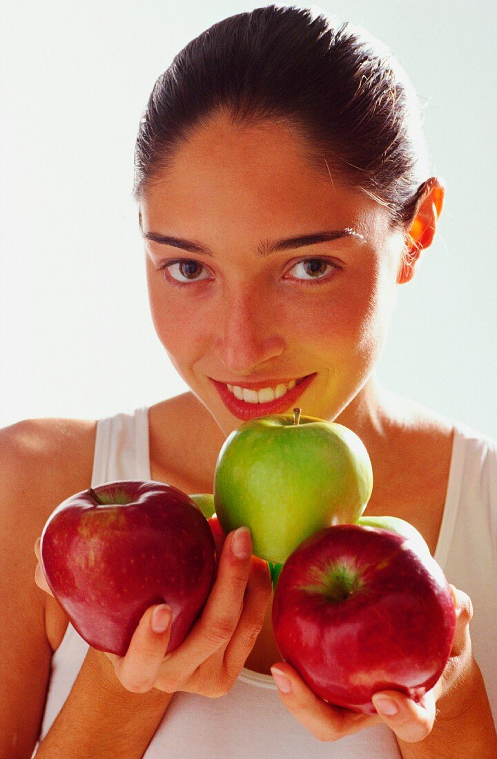 Woman with apples