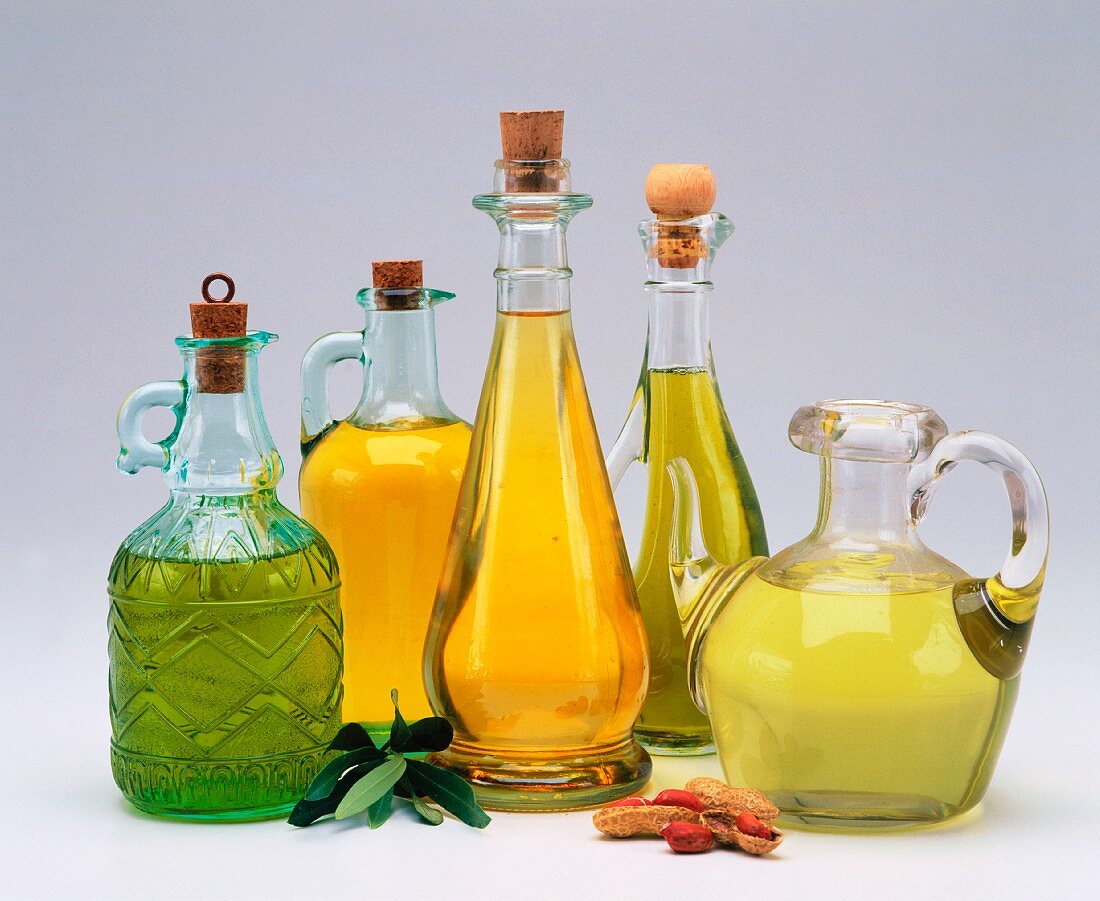 Various types of oil in oil bottles