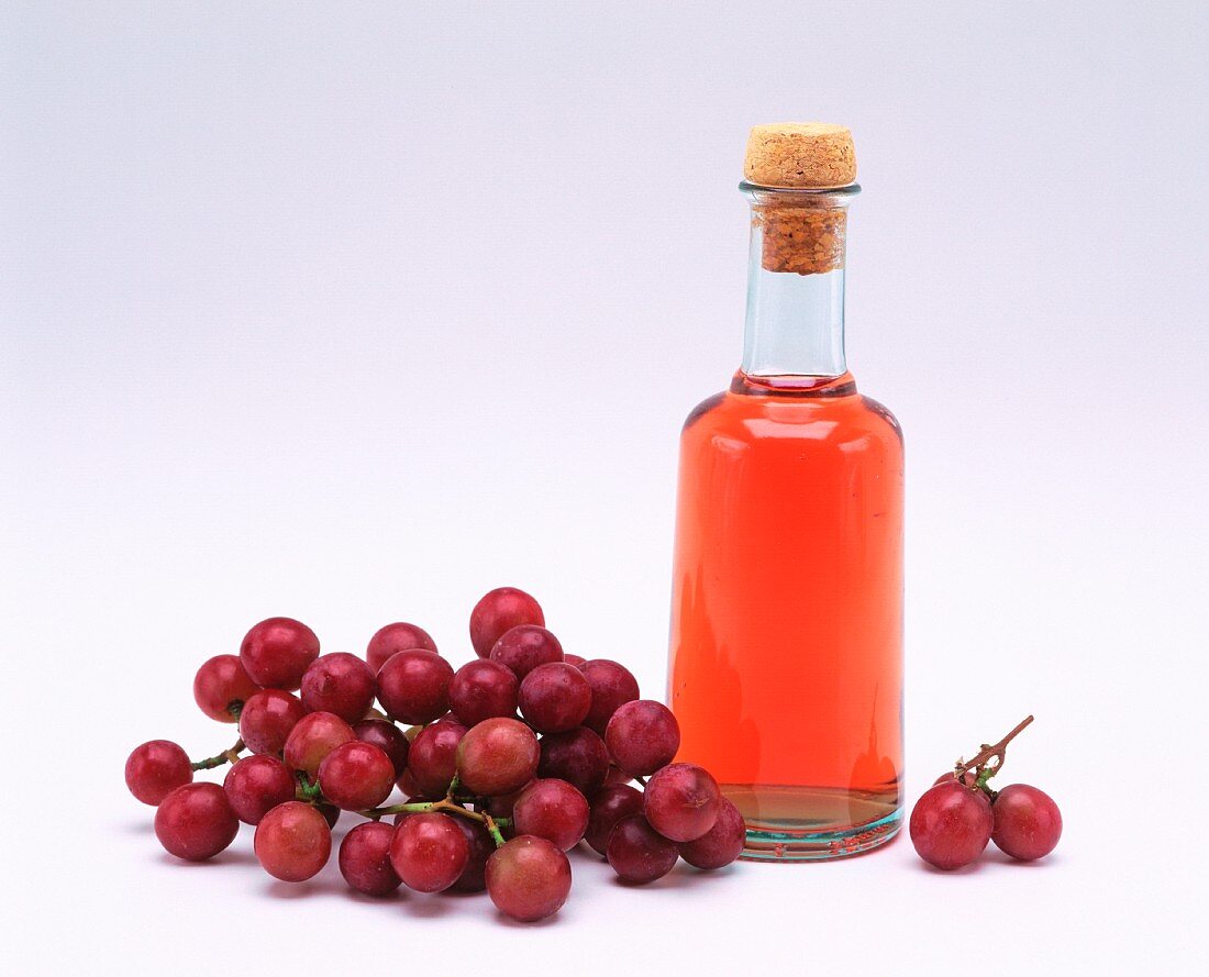 Wine vinegar and grapes