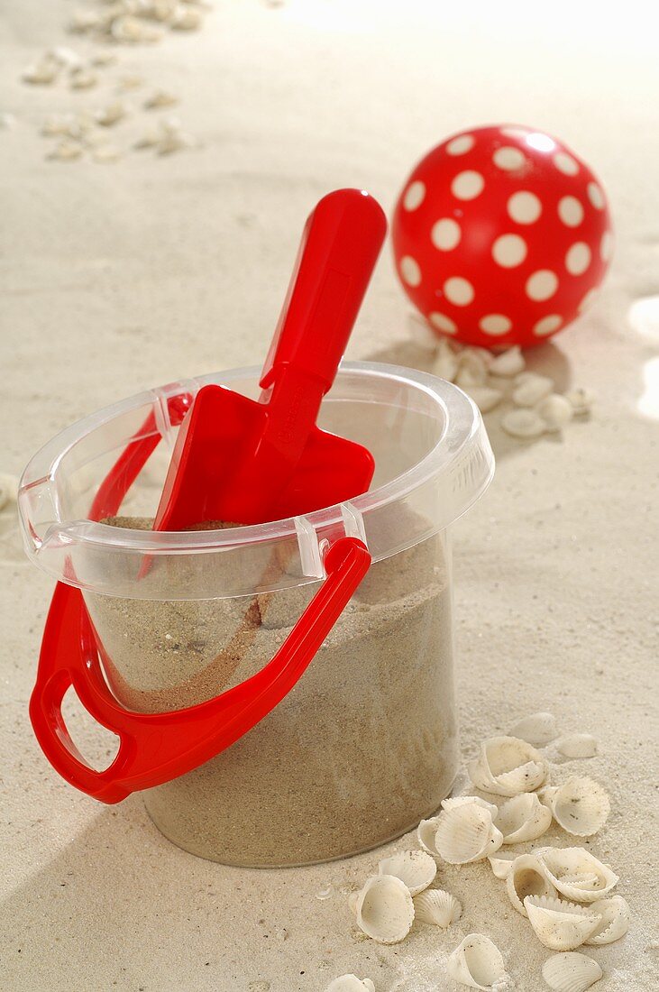 Bucket and spade in sand