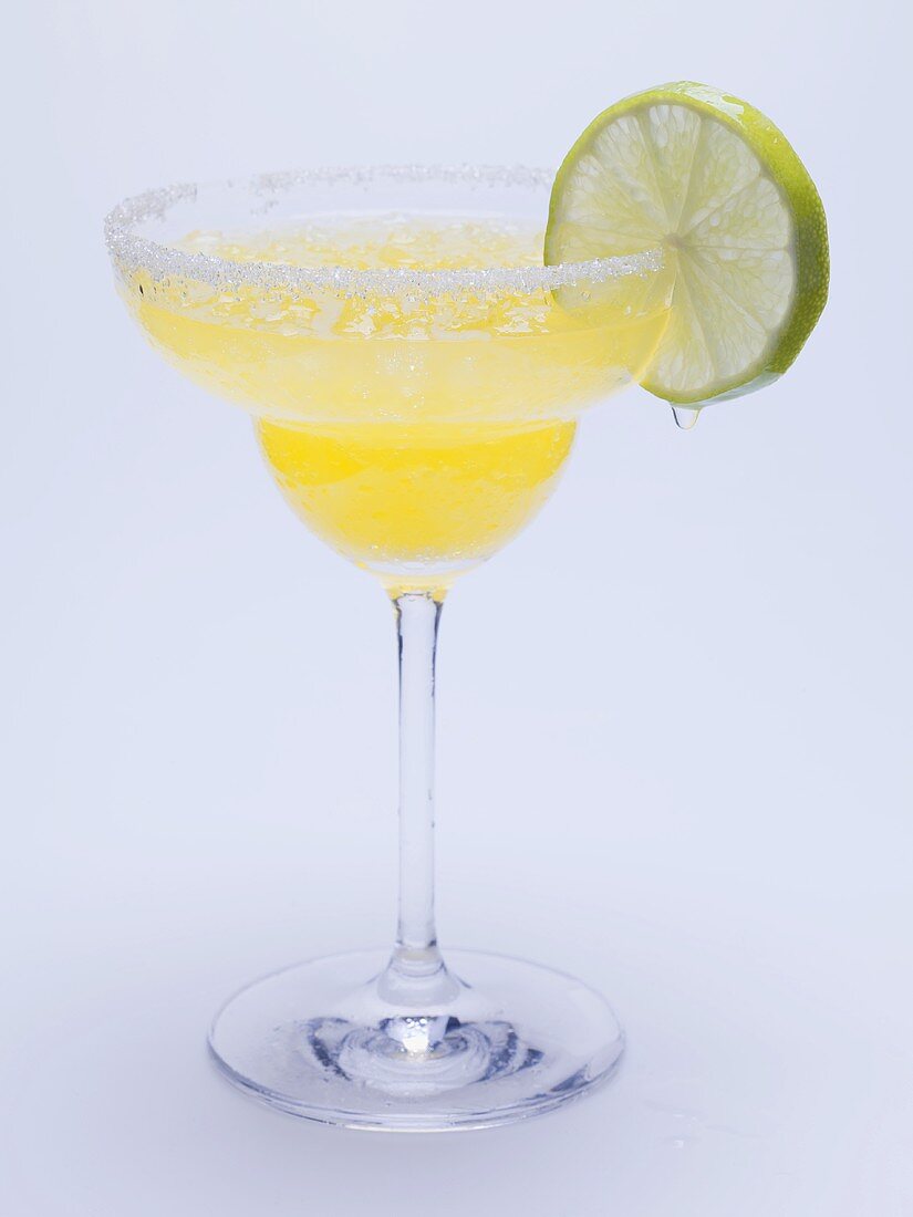 Frozen Margarita with slice of lime