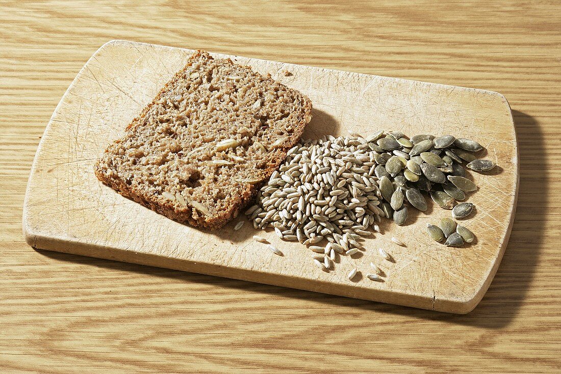 A slice of wholemeal bread with rye and pumpkin seeds