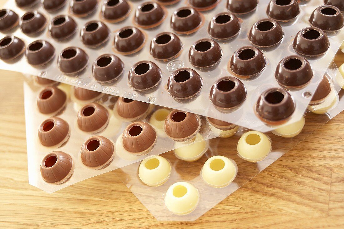 Empty chocolate shells (dark, milk and white chocolate)