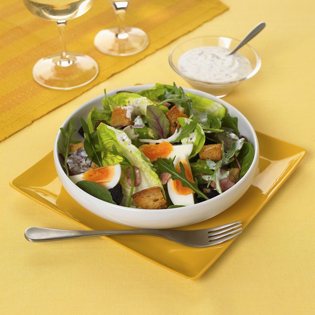 Mixed salad with egg, croutons and yoghurt dressing