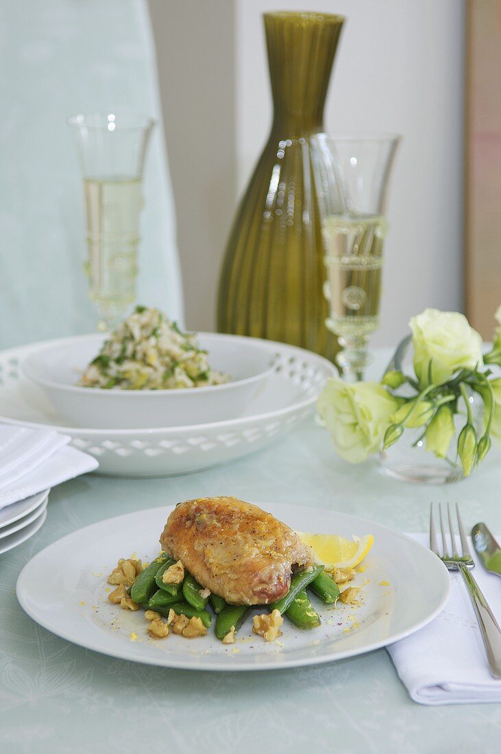 Lemon and garlic chicken on sugar snap peas