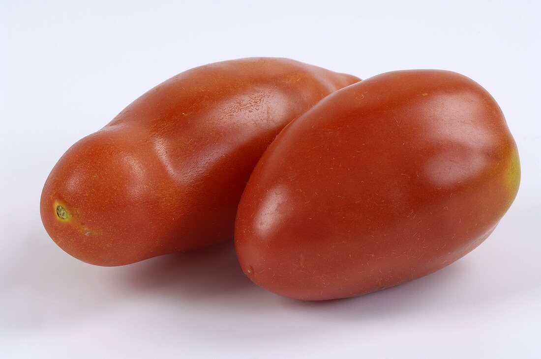 Two plum tomatoes