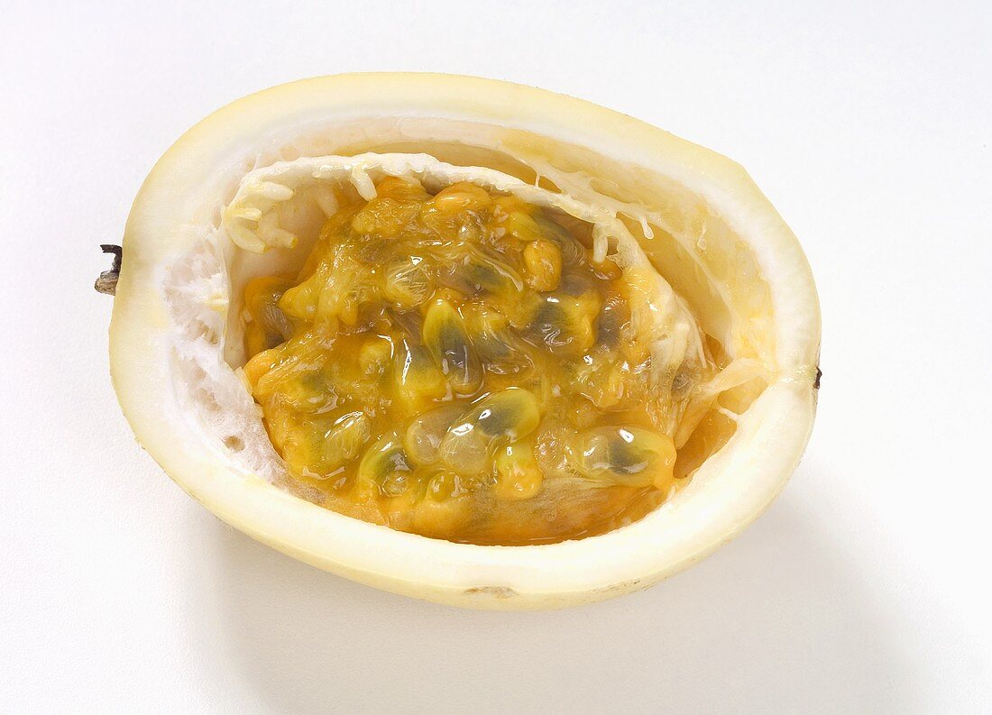 Half of a yellow passion fruit