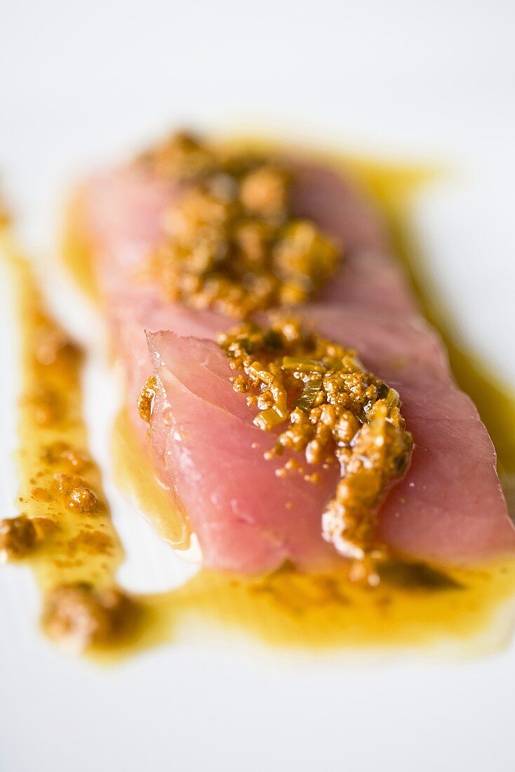 Tuna sashimi with turmeric and ginger marinade