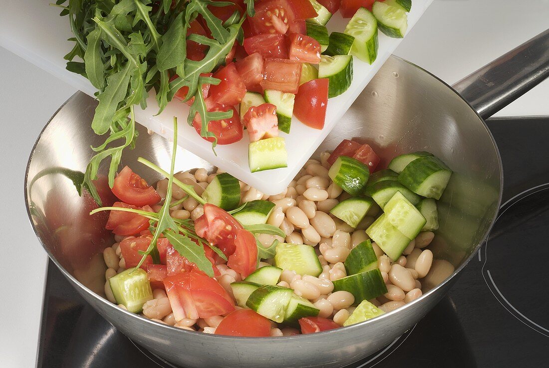 Sweating vegetables in a pan