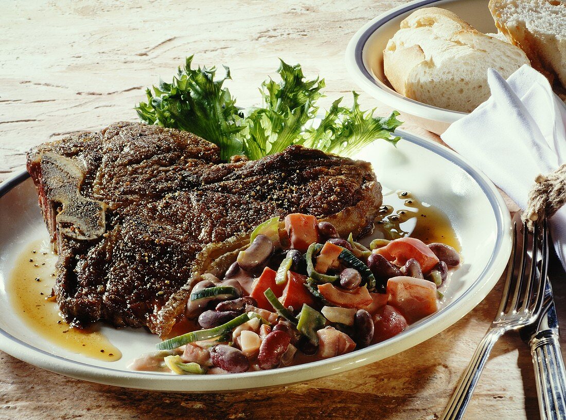 T-bone steak with bean salad