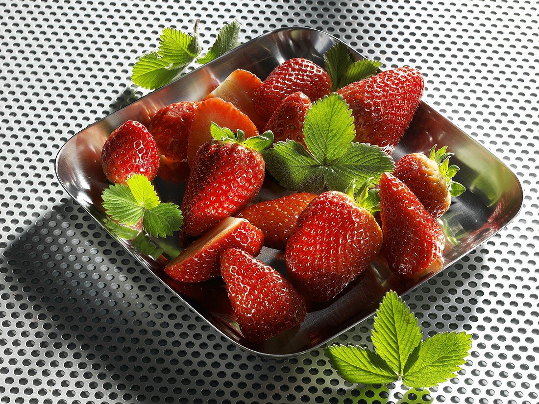Strawberries in a metal dish