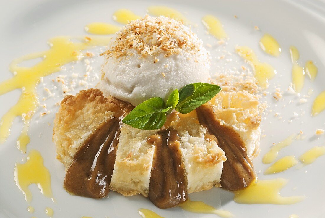 Coconut dessert with ice cream and caramel sauce