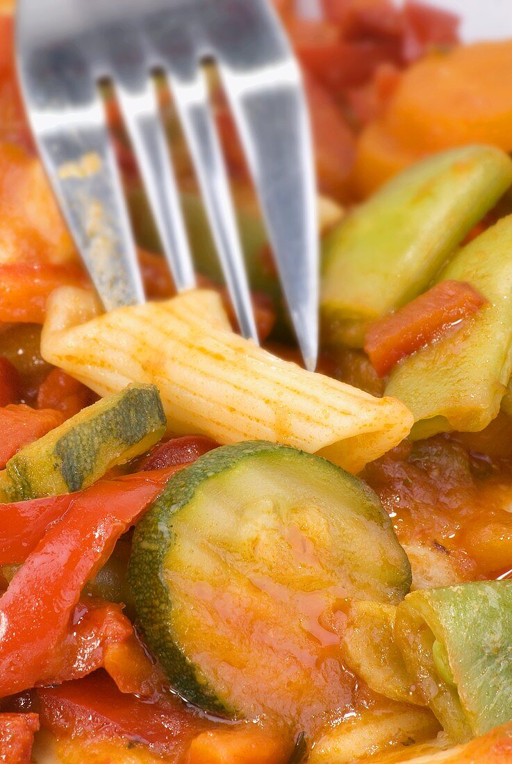 Penne with vegetables and tomato sauce