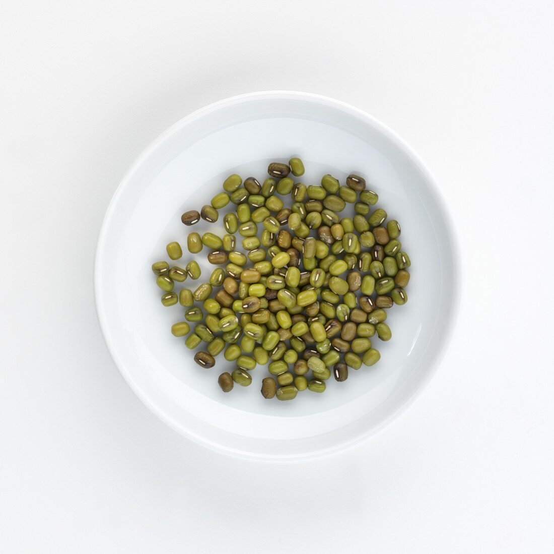 A plate of green mungo beans, seen from above